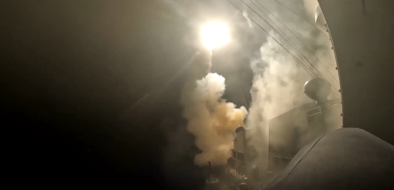 Nighttime missile launch, representing intense US-Iran military clashes and escalating geopolitical risks