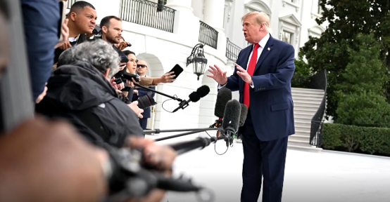 President Trump speaks to media at the White House on Sunday