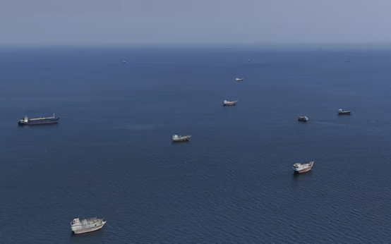 A drone view shows vessels near the Strait of Hormuz, as seen from Musandam, Oman, October 2, 2026