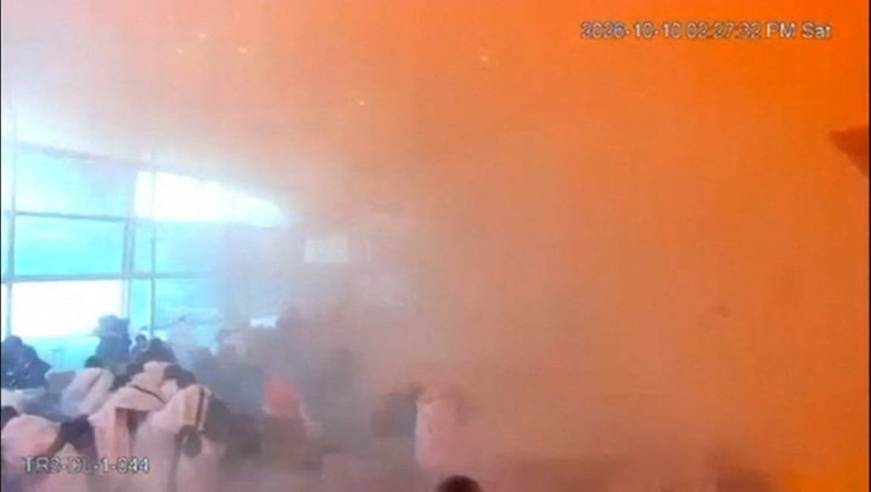 Surveillance footage frame showing smoke and panic during the attack at King Khalid International Airport in Riyadh, Saudi Arabia on October 10, 2026
